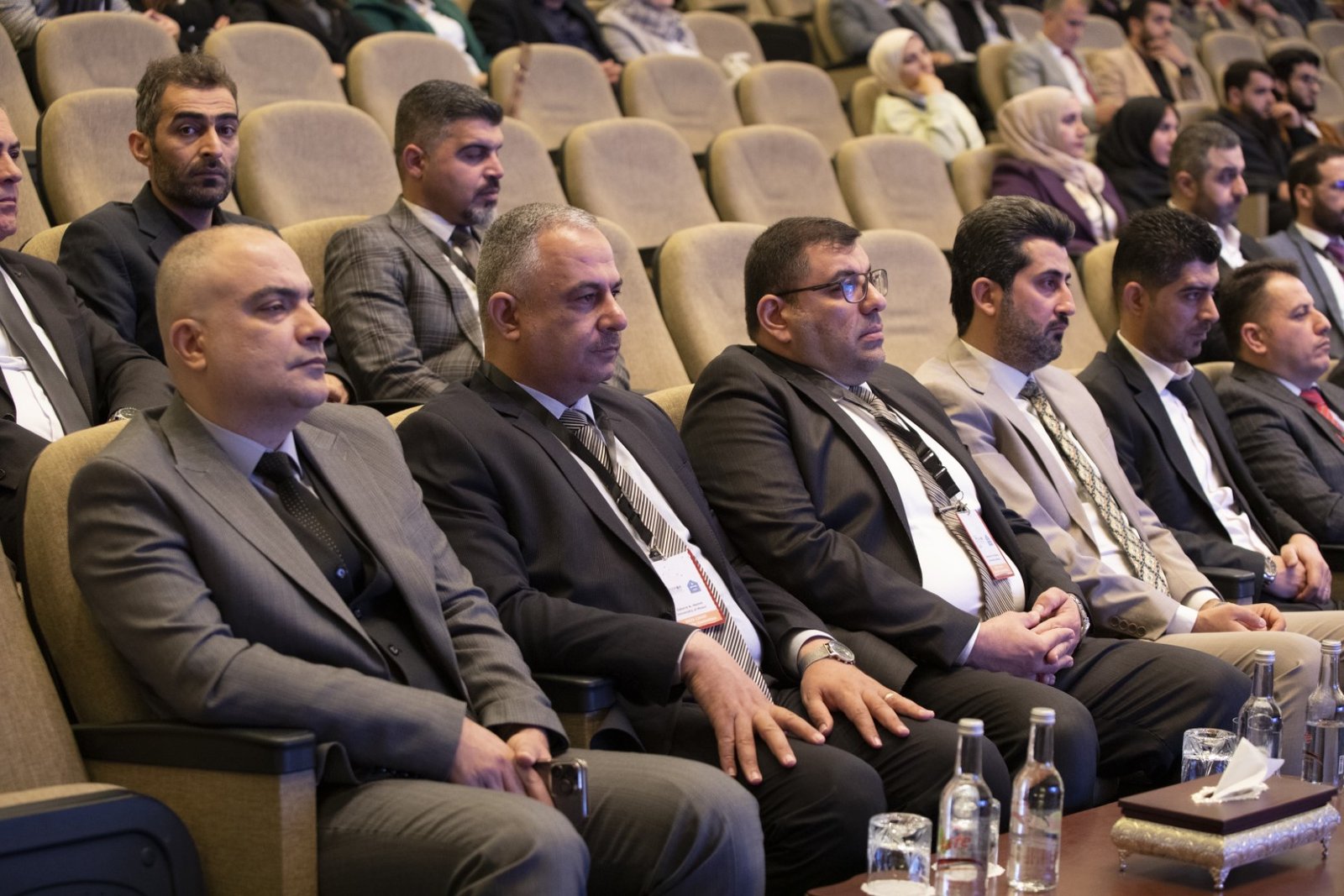 Front rows of the audience in the conference hall